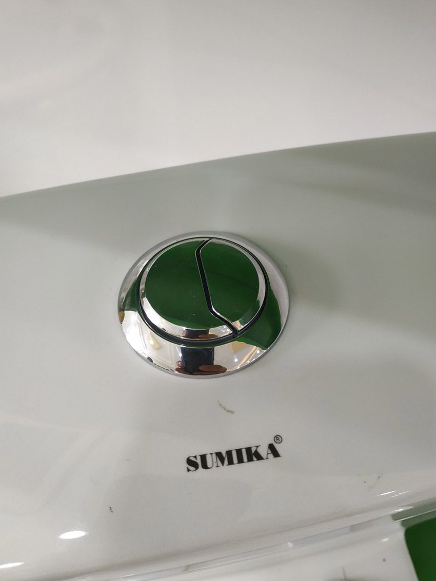 Nút nhấn của bồn cầu một khối Sumika 1018